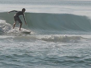 English: Tyler surfing